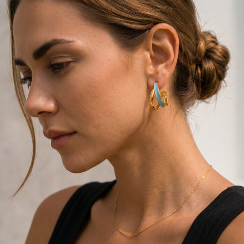 Mein Shop gold hoop earrings with light blue enamel inlay, double loop design.